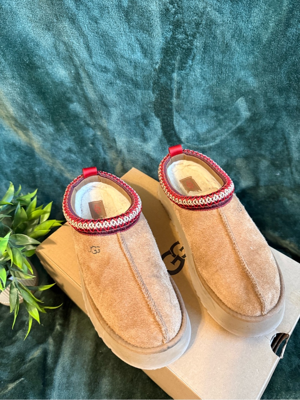 UGG women’s Chestnut Suede Slip-On Loafers with Red Trim